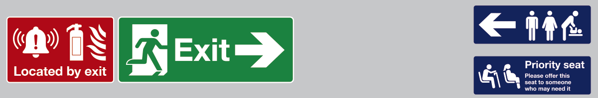 Four signs above the windows in a train carriage in a tidy, easy to understand arrangement.