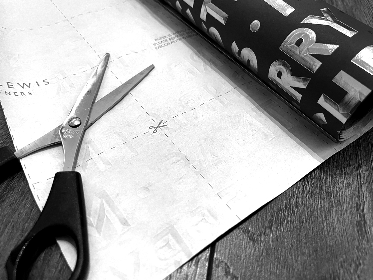 Christmas wrapping paper with a handy grid printed on the back.